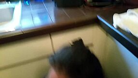 Kristine Boag delivers a homemade blowjob with glasses on, sucking amateur cock passionately.