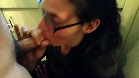 Kristine Boag delivers a homemade blowjob with glasses on, sucking amateur cock passionately.