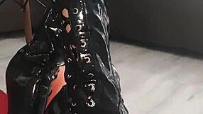 In a cozy room, Veve slips into latex stockings and pops balloons with a sharp needle, her blonde curves on display.