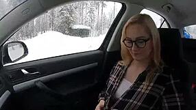 Beautiful Blonde Faces Snow Storm in Public Outdoor Setting