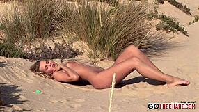 Zuzana z makes sand angels as a hot blonde outdoors