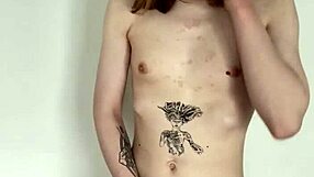 The tattooed transsexual slut jerks her cock in a solo masturbation session