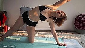 Detailed yoga lesson with clothed instructor demonstrating poses and movements on a mat