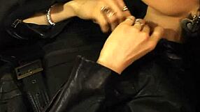 Hey, check out this milf rocking a long leather skirt and boots! Wanna see her kinky side?