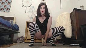 Transsexual Webcam Model Assfucks Herself with Gigantic Dildo