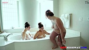 Adora Remi and Ruby engage in playful interactions in the tub, exploring their connection through gentle touches and kisses.