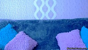 Busty blonde amateur performs homemade anal fisting on webcam, showcasing big tits and cute ass