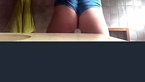 girl records in bathroom