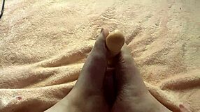 Hey, check out this slow, barefoot footjob from a cute amateur in her homemade setup 😍