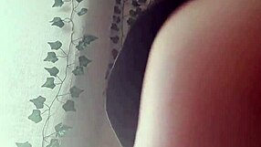 The Sexy Redhead Stands in the Wind, Her Hair Flowing Freely as She Poses Seductively