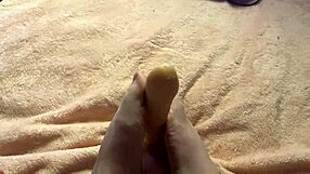 Hey, check out this slow, barefoot footjob from a cute amateur in her homemade setup 😍