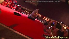 busty milf takes the stage