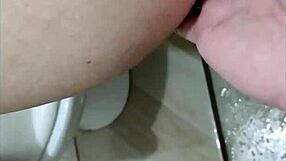 The married woman feels her lover's cum filling her ass with intense pleasure.