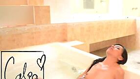 Calia Qadehs fucks dildo in jacuzzi bath.