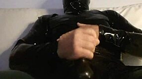 she's stroking her pussy in tight latex