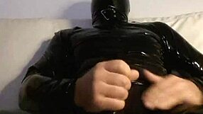 she's stroking her pussy in tight latex