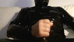 she's stroking her pussy in tight latex