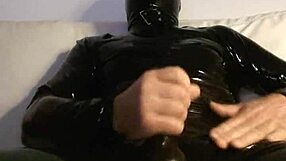 she's stroking her pussy in tight latex