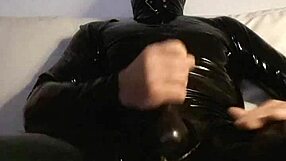 she's stroking her pussy in tight latex