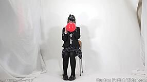 Girl excitedly plays with balloons