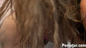 Ariel Stoman and Daisy Layne enjoy water spray outdoors