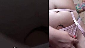 shaved brunette with wet pussy teases with see-through dildo