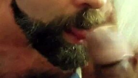 in the hotel room, he eagerly takes his partner's cum facial