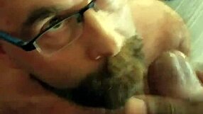 in the hotel room, he eagerly takes his partner's cum facial