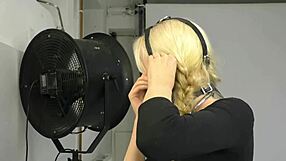 Bound in bondage, the submissive wears a ball gag harness, part 01 of the BDSM session.