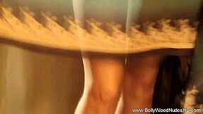 brunette indian woman undresses and dances in erotic striptease