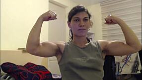 Athletic Bodybuilder Flexes Muscular Biceps On Camera With Flexible Sporty Moves