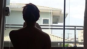 watching her clean in shorts without panties revealing big tits and monster cock