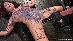 Can This Redhead In Bondage Handle The Wax And Deepthroat?