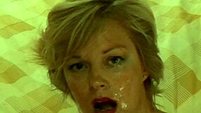 Feeling the intense pleasure from beautiful blonde MILF blowjob and facial.