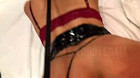 latina poses in latex skirt for interracial scene