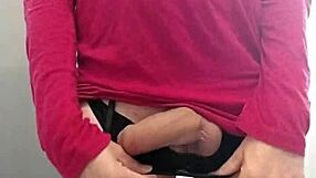 Travesti enjoying a wild ride on a thick dildo