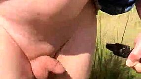 Mature woman masturbates naked outdoors!