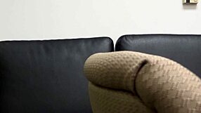 Zelda participates in a casting interview on the sofa.