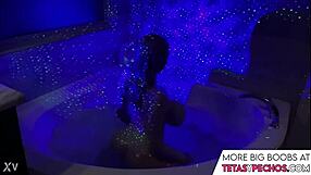 blue shows off her big tits in the bath tub