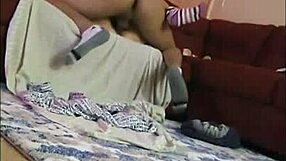 A horny wife explores double penetration with her husband using a dildo in their amateur session.