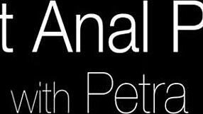 A young babe engages in softcore solo play.