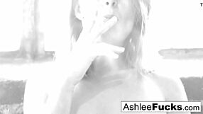 Ashlee Graham smokes while showing her natural tits.