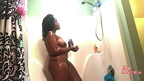 Shower cam catching curvy ebony with big assets