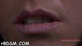 Bold brunette babe spreads wide in intense bondage blowjob