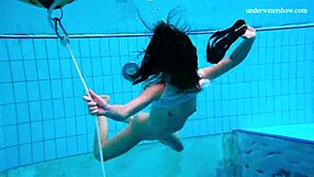 Look at this horny Russian teen stripping naked underwater to show her tight pussy!