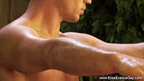 A gay couple indulges in an erotic massage on the table.