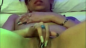 Brunette slut teases followers with finger sucking and masturbation, hinting at anal desires