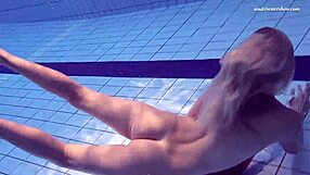 elena proklova, blonde teen 18+, shows off tight pussy and natural tits in pool dress.