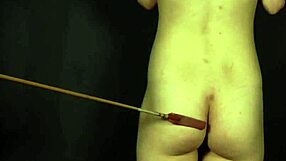Female slave endures whipping and spanking