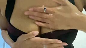 washing bosses cum off face and tits